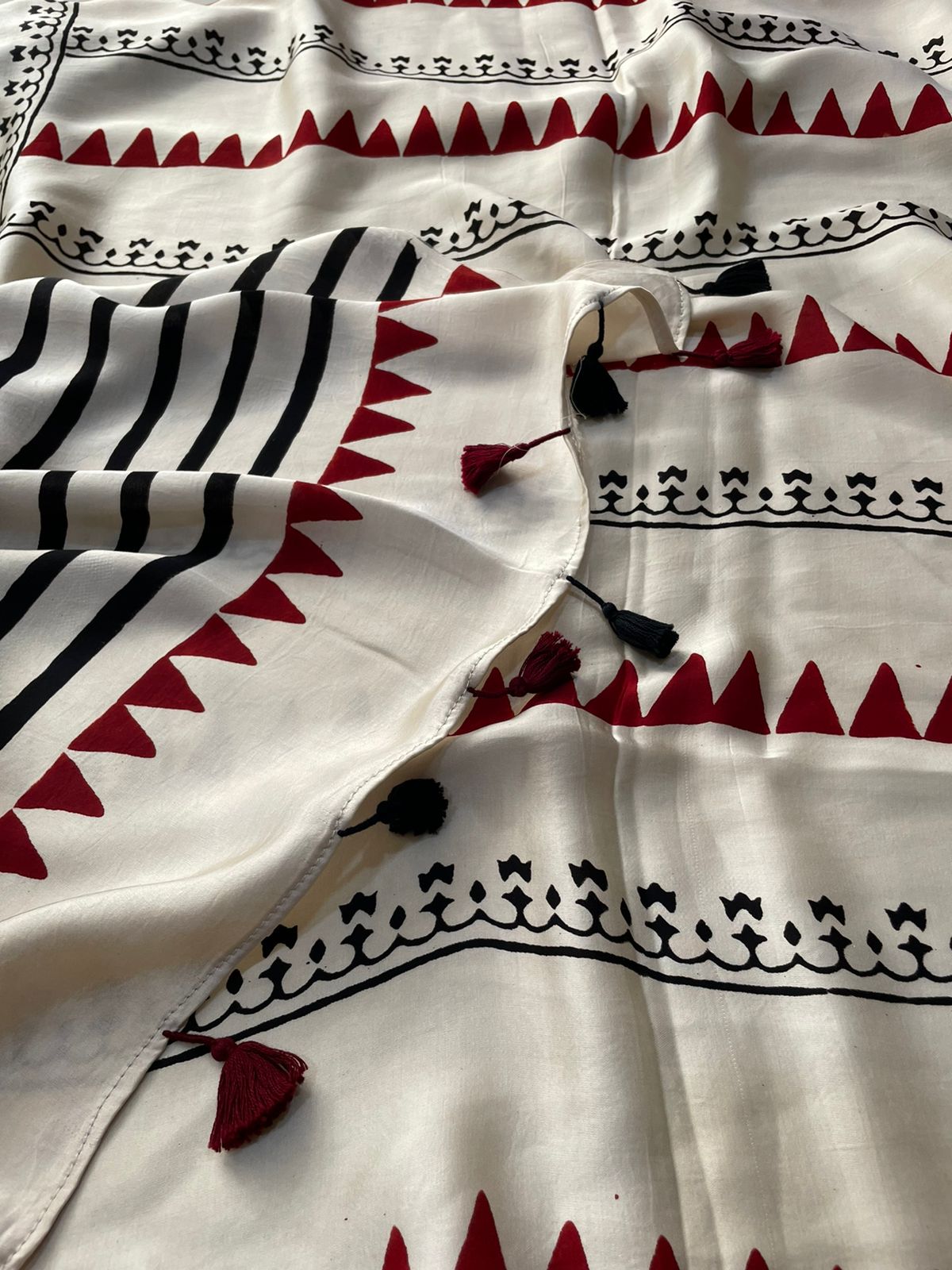 Handblock printed modal silk Saree in black, red & white